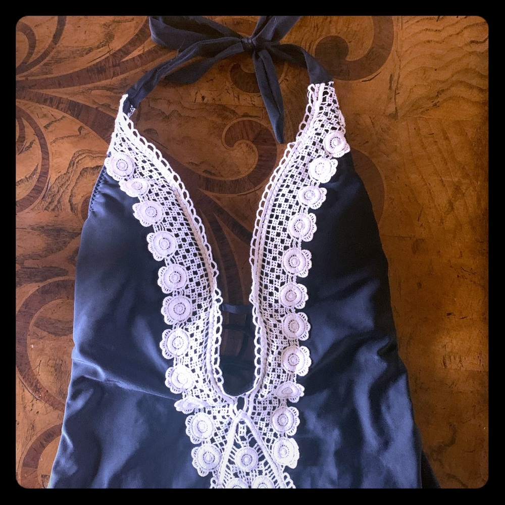Flattering one piece black swimsuit w/ lace detail